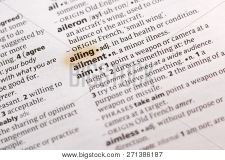 The Word Or Phrase Ailing In A Dictionary Highlighted With Marker.