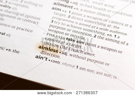 The Word Or Phrase Aimless In A Dictionary Highlighted With Marker.