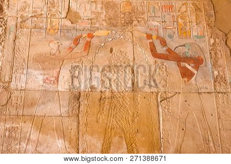 Egyptian Hieroglyphs And Drawings On The Walls And Columns. Egyptian Language, The Life Of Ancient G