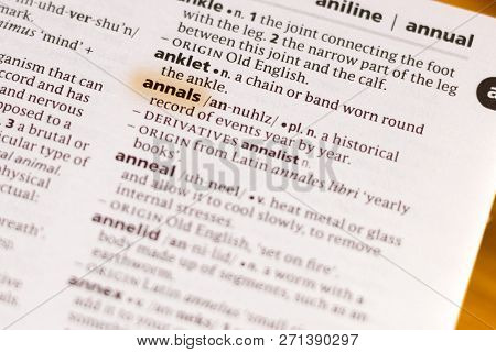 The Word Or Phrase Annals In A Dictionary Highlighted With Marker.