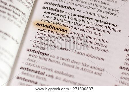 The Word Or Phrase Antediluvian In A Dictionary Highlighted With Marker.