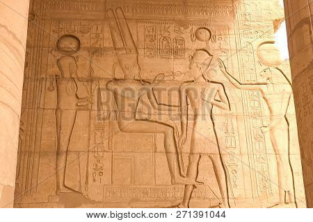 Egyptian Hieroglyphs And Drawings On The Walls And Columns. Egyptian Language, The Life Of Ancient G