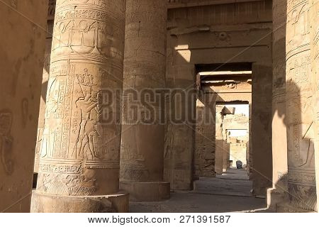Egyptian Hieroglyphs And Drawings On The Walls And Columns. Egyptian Language, The Life Of Ancient G