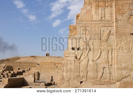 Egyptian Hieroglyphs And Drawings On The Walls And Columns. Egyptian Language, The Life Of Ancient G