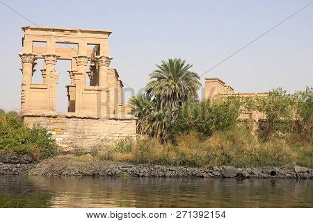 Buildings And Columns Of Ancient Egyptian Megaliths. Ancient Ruins Of Egyptian Buildings