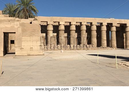 Buildings And Columns Of Ancient Egyptian Megaliths. Ancient Ruins Of Egyptian Buildings