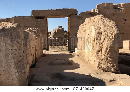 Buildings And Columns Of Ancient Egyptian Megaliths. Ancient Ruins Of Egyptian Buildings