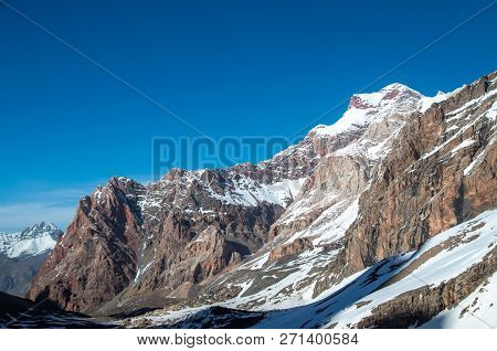 Very High Mountains In Central Asia, Tajikistan, During Drekking And Climbing