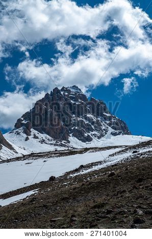 Very High Mountains In Central Asia, Tajikistan, During Drekking And Climbing