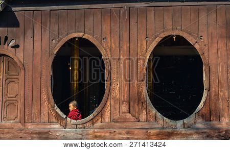 Nyaungshwe, Myanmar - Feb 8, 2017. Novice Monks Sitting At Shwe Yan Pyay Monastery In Nyaungshwe, My