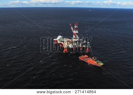 Oil Offshore Platform In The Sea. Extraction Of Oil On The Shelf.