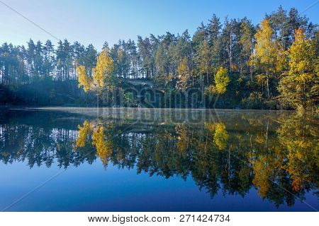 Korostyshevsky Quarry, Zhytomyr Region, Ukraine. Beautiful Landscape With Forest Reflection In Water