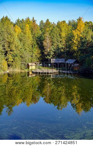 Korostyshevsky Quarry, Zhytomyr Region, Ukraine. Beautiful Landscape With Forest Reflection In Water