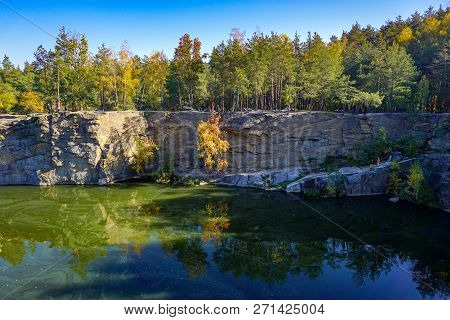 Korostyshevsky Quarry, Zhytomyr Region, Ukraine. Beautiful Landscape With Forest Reflection In Water