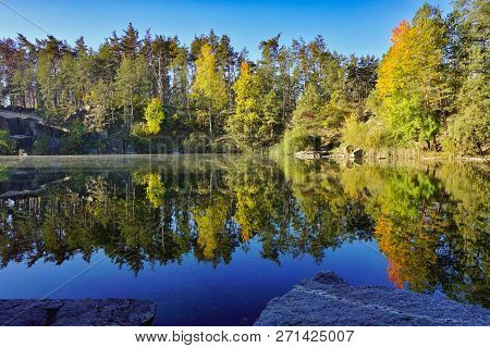 Korostyshevsky Quarry, Zhytomyr Region, Ukraine. Beautiful Landscape With Forest Reflection In Water