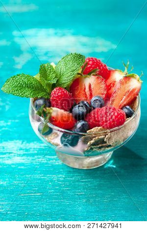Summer Dessert With Strawberries On A Wooden Background.