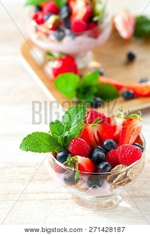 Summer Dessert With Strawberries On A Wooden Background.