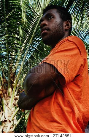 Lolits Village, Espiritu Santo Island / Vanuatu - Aug 10 2016 : Young Black Man Standing In Front Of