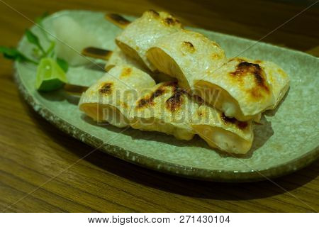Salmon Toro Kushiyaki. Grilled Salmon Toro On Skewer In Japanese Restuarant.