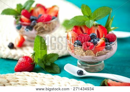 Summer Dessert With Strawberries On A Wooden Background.