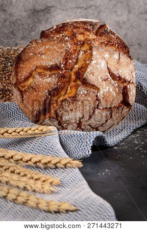 Fresh Fragrant Bread On The Table. Food Concept. Bakery, Crusty Loaves Of Bread And Buns. Assortment