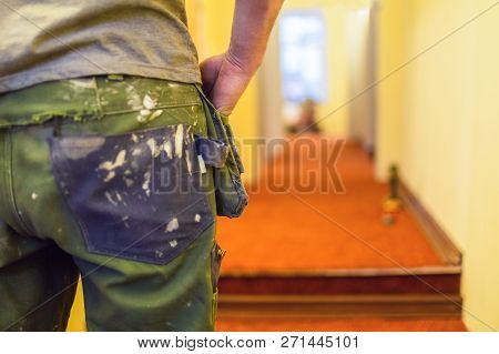 The Dirty Uniform Or Boilersuit In White Paint - Working Dress Of Worker In House Is Under Construct