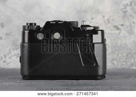 Moscow, Russia, November 29, 2018. The Old Soviet 35 Mm Slr Camera Zenit 122, Released 1997, On A Gr