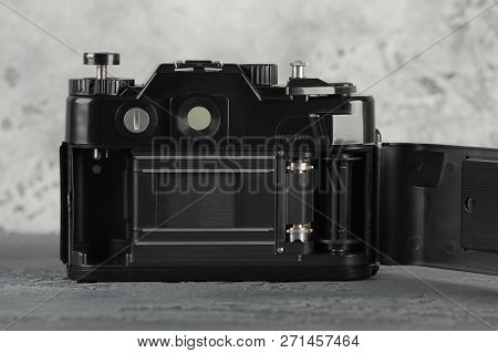 Moscow, Russia, November 29, 2018. The Old Soviet 35 Mm Slr Camera Zenit 122, Released 1997, On A Gr