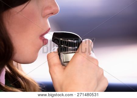 Woman Taking Alcohol Test