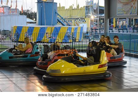 Orlando, Florida.  November 08, 2018. People Enjoy Bamper Cars In Vintage Park At Kissimmee Area.