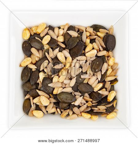 Variety Of Nuts And Seeds For Salad In A Bowl Isoladet On White Background