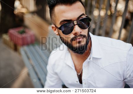 Close Up Photo Of Stylish Arabian Man Model In White Shirt And Sunglasses. Beard Attractive Arab Guy