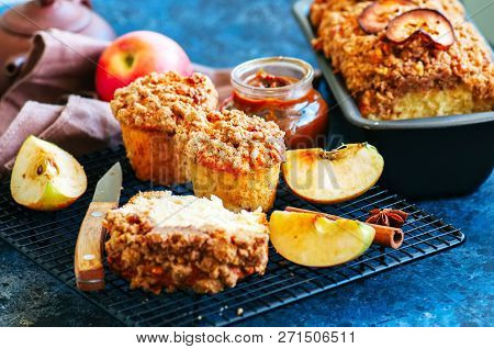 Homemade Apple Crumble Cake Served On A Wire Rack On A White Sto