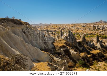 Cappadocia, Turkey: Beautiful Landscape On The Panorama Of Mountains And Rocks. The Fortress Of Uchi