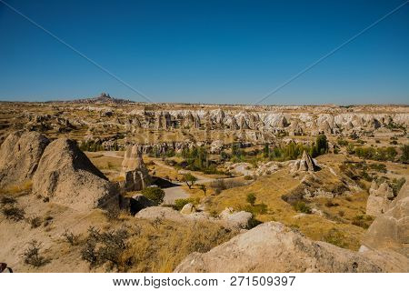 Cappadocia, Turkey: Beautiful Landscape On The Panorama Of Mountains And Rocks. The Fortress Of Uchi