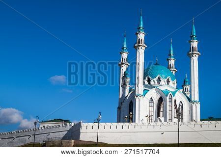 Minarets Of The Mosque Against The Blue Sky