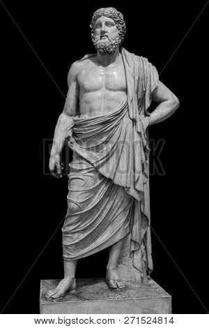 Marble statue of greek god Zeus isolated on black background