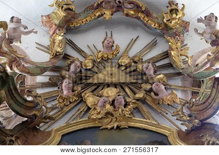 BRONNBACH, GERMANY - JULY 07, 2018: God's all-seeing eye, Saint Jude the Apostle altar in Cistercian Abbey of Bronbach in Reicholzheim near Wertheim, Germany