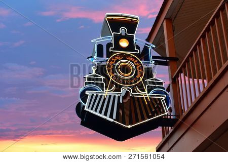 Orlando, Florida.  November 12 , 2018 Top View Of Old Town Sign On Colorful Sunset Sky Background At