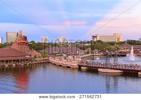 Orlando, Florida. November 15, 2018 Panoramic View Of Volcano, Vintage Bridge And Hotels On Sunset W