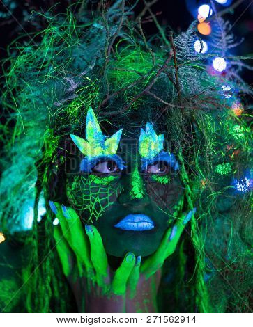 Mystic Green Dryad In Uv Fluor Black Light With Glowing Trees On Background