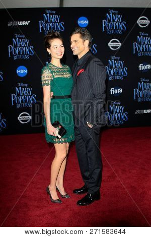 LOS ANGELES - NOV 29:  Caitlin McHugh, John Stamos at the 