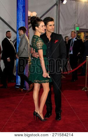 LOS ANGELES - NOV 29:  Caitlin McHugh, John Stamos at the 