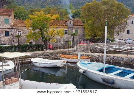 Autumn Day In Small Mediterranean Town. Montenegro, Adriatic Sea, Bay Of Kotor.  View Of Ancient Tow