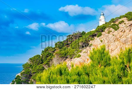 Beacon At The Cliffs On Majorca Island, Cape At Cala Ratjada, Spain Mediterranean Sea