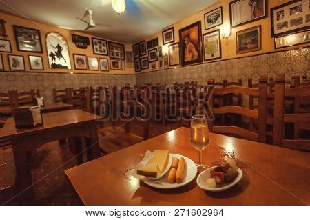 Cordoba, Spaine - Nov 18: Glass Of White Sherry Or Wine On Table Of The Traditional Tapas Bar Or Res
