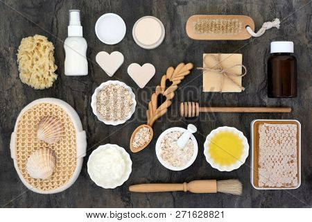 Natural skincare ingredients and products, health care concept beneficial for skin ailments including psoriasis, eczema and acne. Top view on marble.