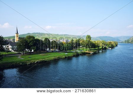Panoramic View Of Moselle Valley In Germany. Vineyards And River Mosel In Trittenheim In Summer.