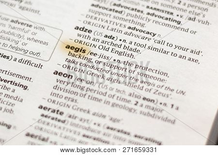 The Word Or Phrase Aegis In A Dictionary Highlighted With Marker.