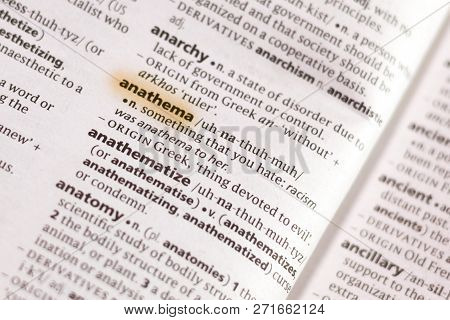 The Word Or Phrase Anathema In A Dictionary Highlighted With Marker.